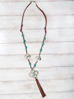Boots, Jeans & Turquoise Necklace