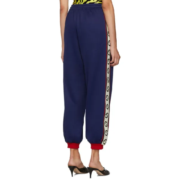 Gucci GG Logo Stripe Jersey Track Pants in Blue