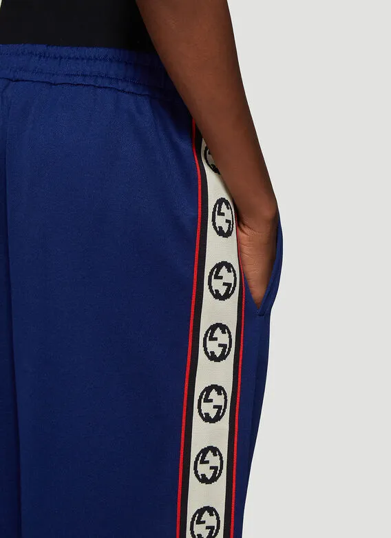 Gucci GG Logo Stripe Jersey Track Pants in Blue