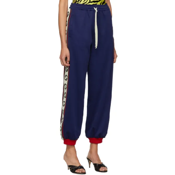 Gucci GG Logo Stripe Jersey Track Pants in Blue
